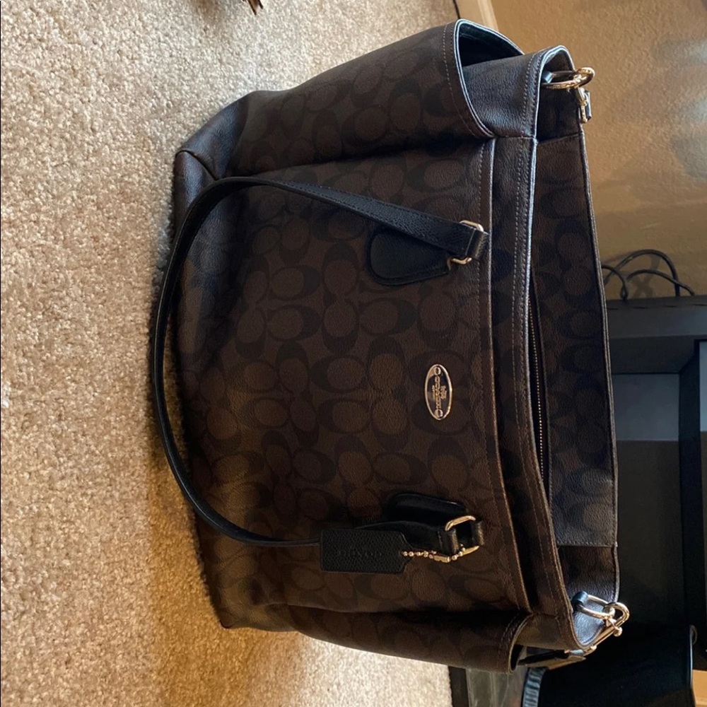 Coach diaper bag with changing pad